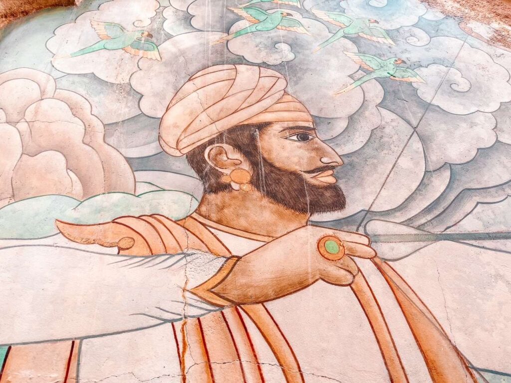 Look Close Hidden Mickey Earring in the mural in Animal Kingdom