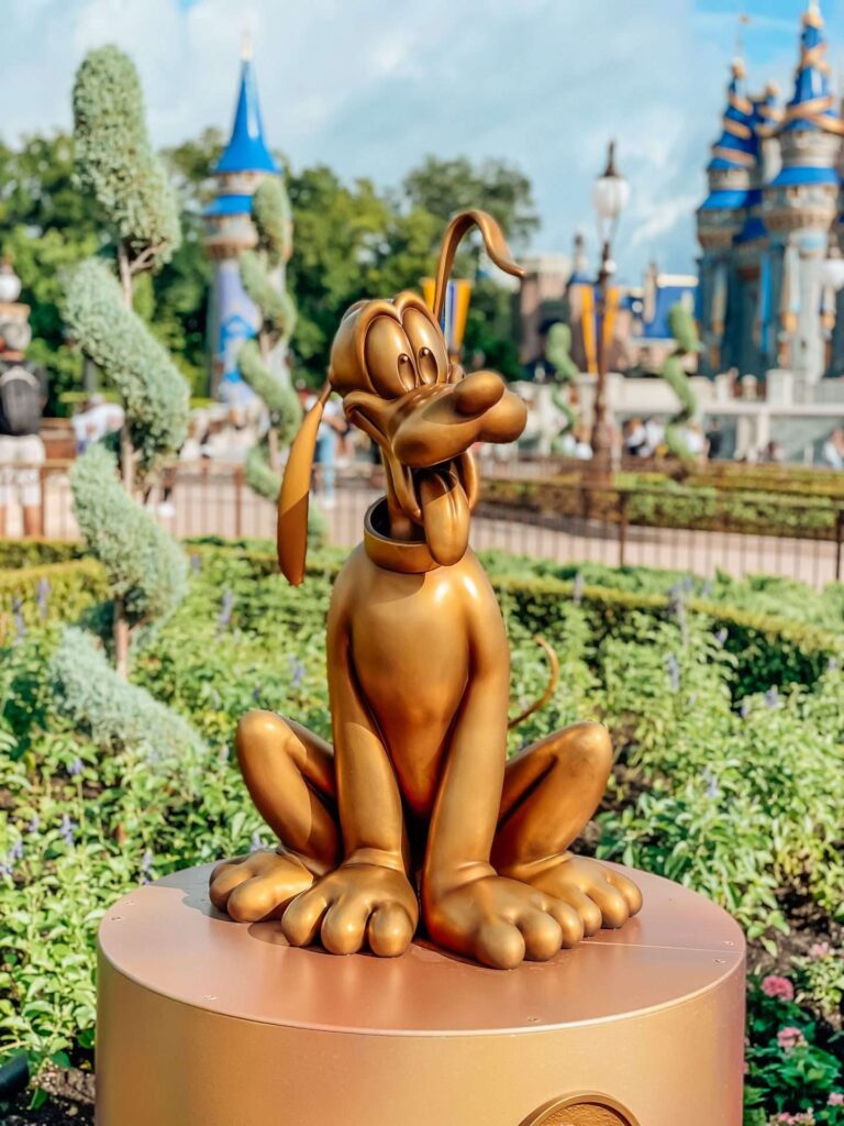 Pluto Gold character Statue Disney World