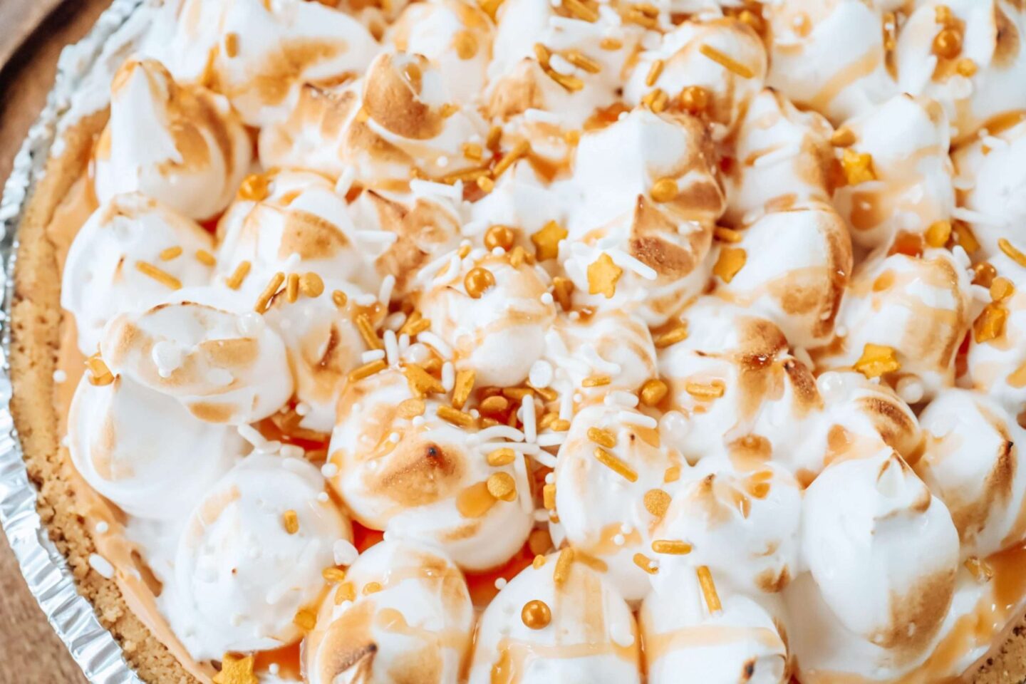 Piping Italian Meringue onto a pie